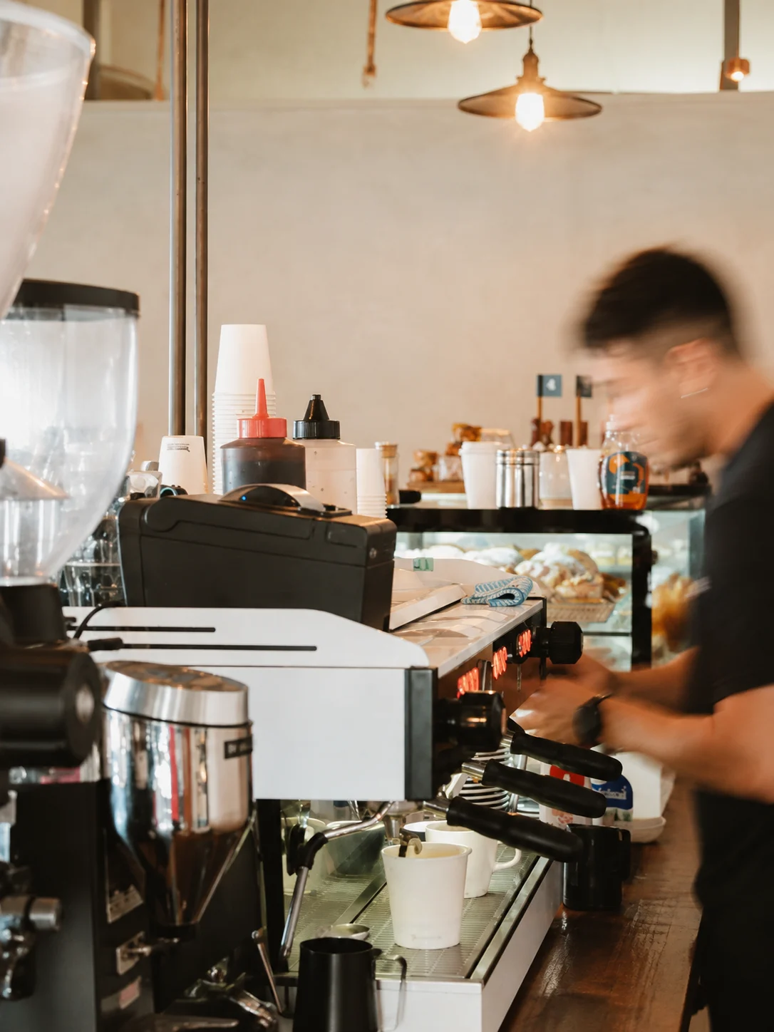 Inside Eddie's parlour with the team working behind the counter