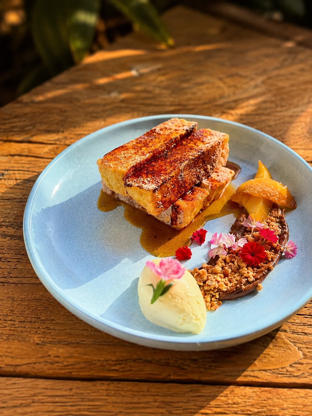 French toast with fruit, flowers and sauce at Eddie's